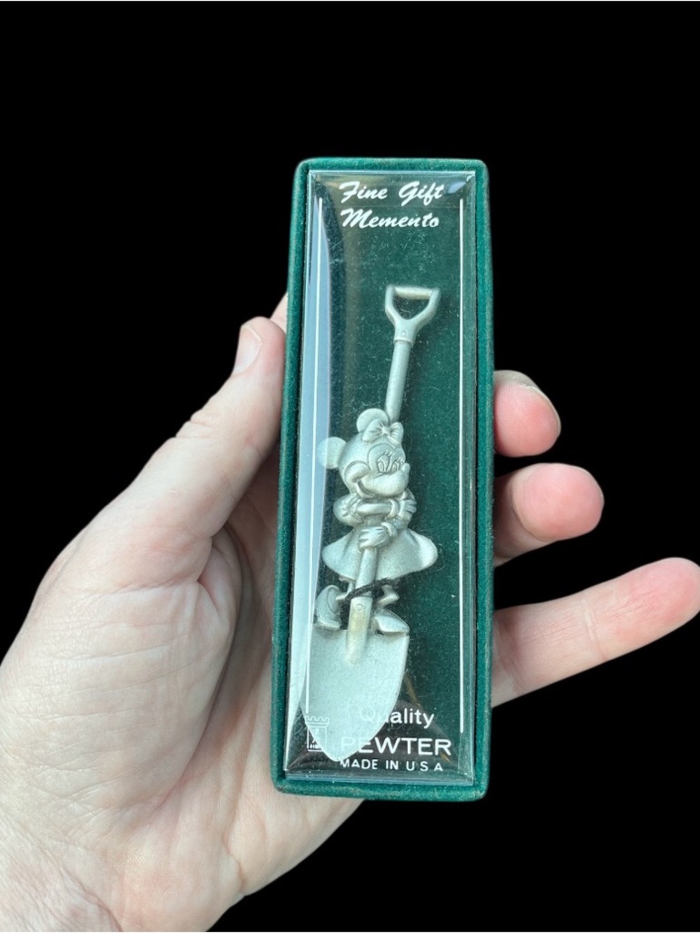 Vintage Disney pewter souvenir spoon featuring a Minnie Mouse figure.